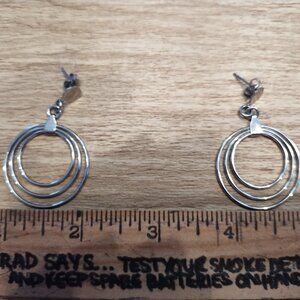 Costume jewelry silver hanging hoop earrings